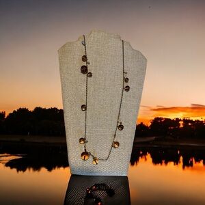 J Crew root beer glass beads pendant